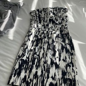 Black and white graphic dress with flutter sleeves